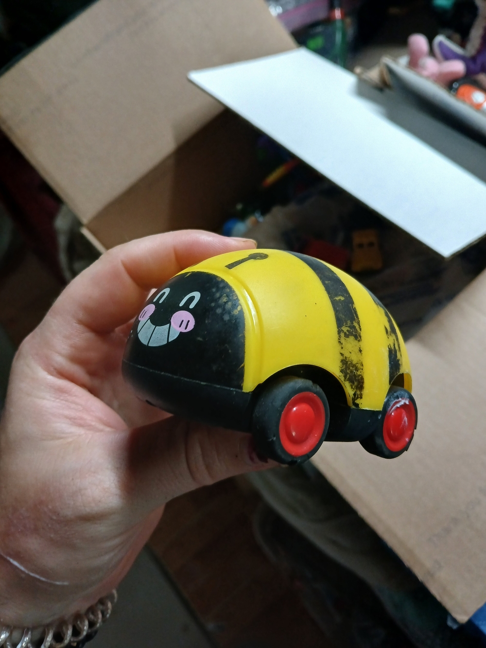 yellow plastic bee car with black stripes and red wheels Big Time Toys Untested